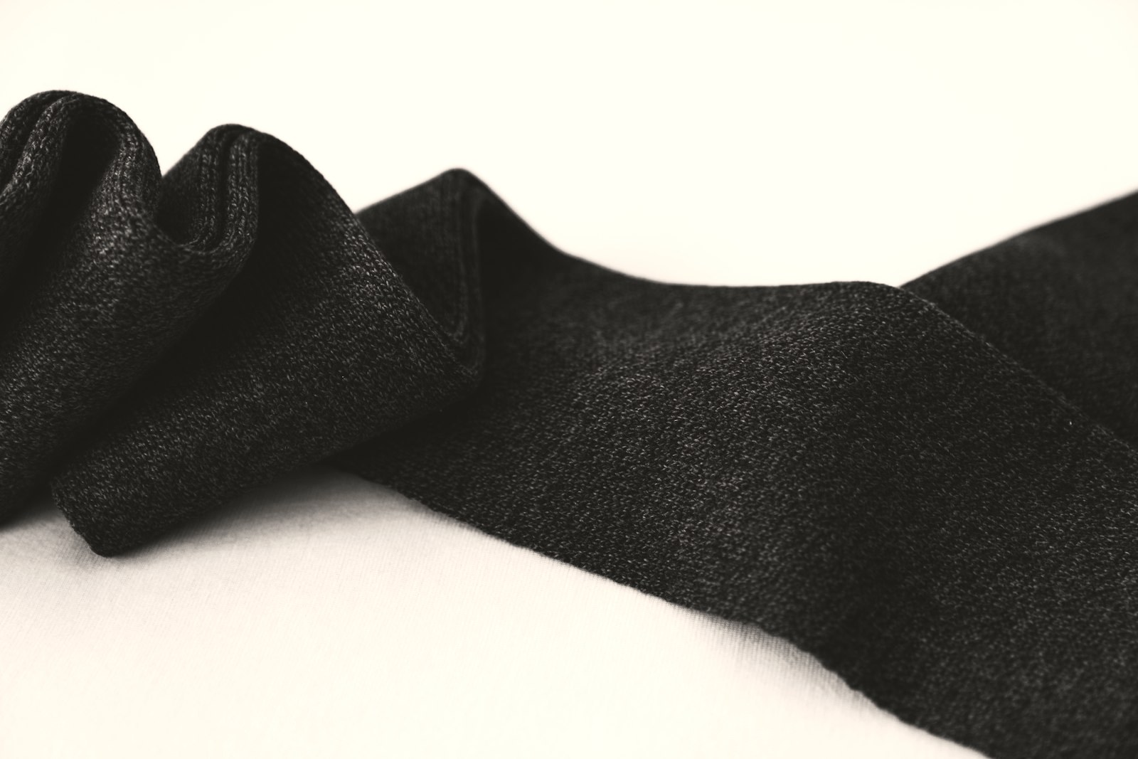 Dark cloth in a macro drape, no canvas weight in sight
