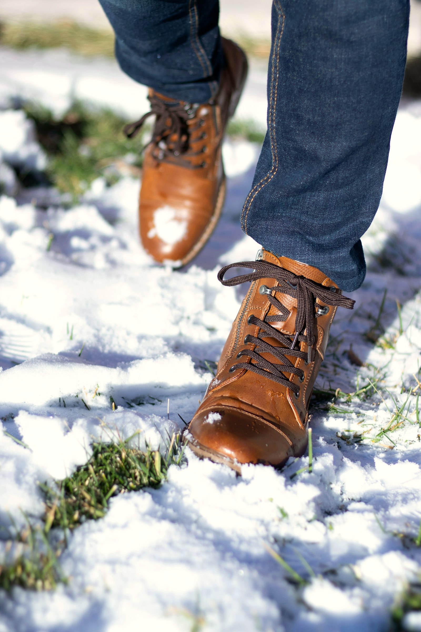 Boots walking through fresh snow